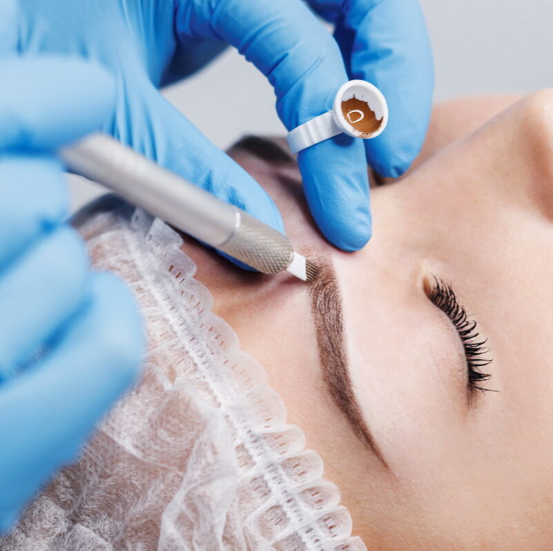 woman getting microblading treatment