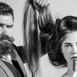 man with scissor and woman with long hair